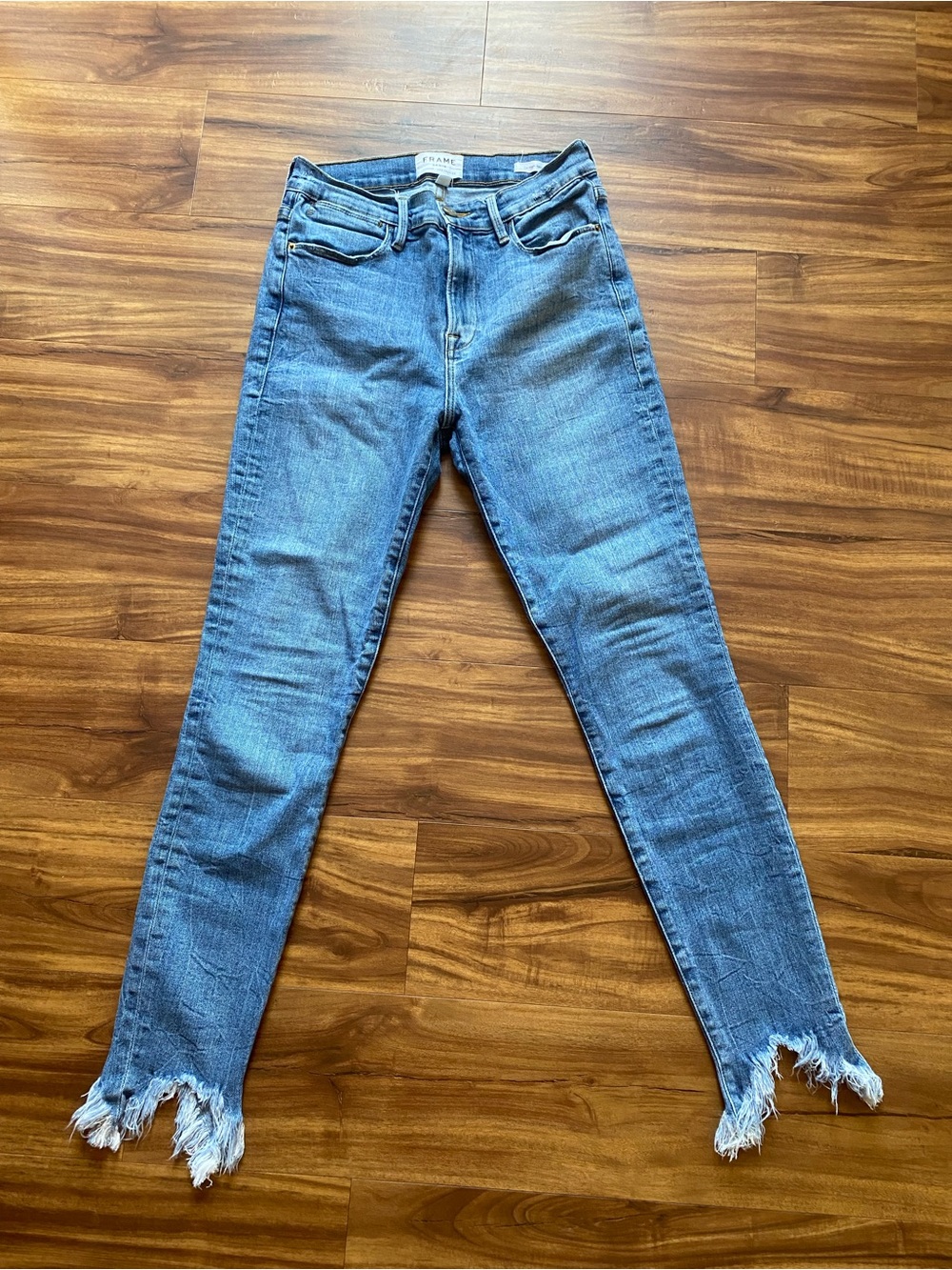 Frame Denim Blue Skinny Jeans with Frayed Hem